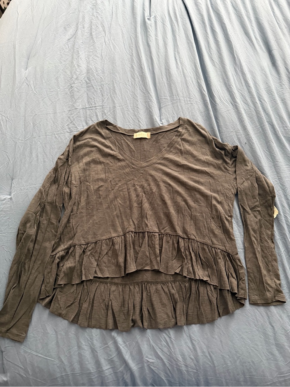 Women’s Ruffle-Hem V-Neck Top